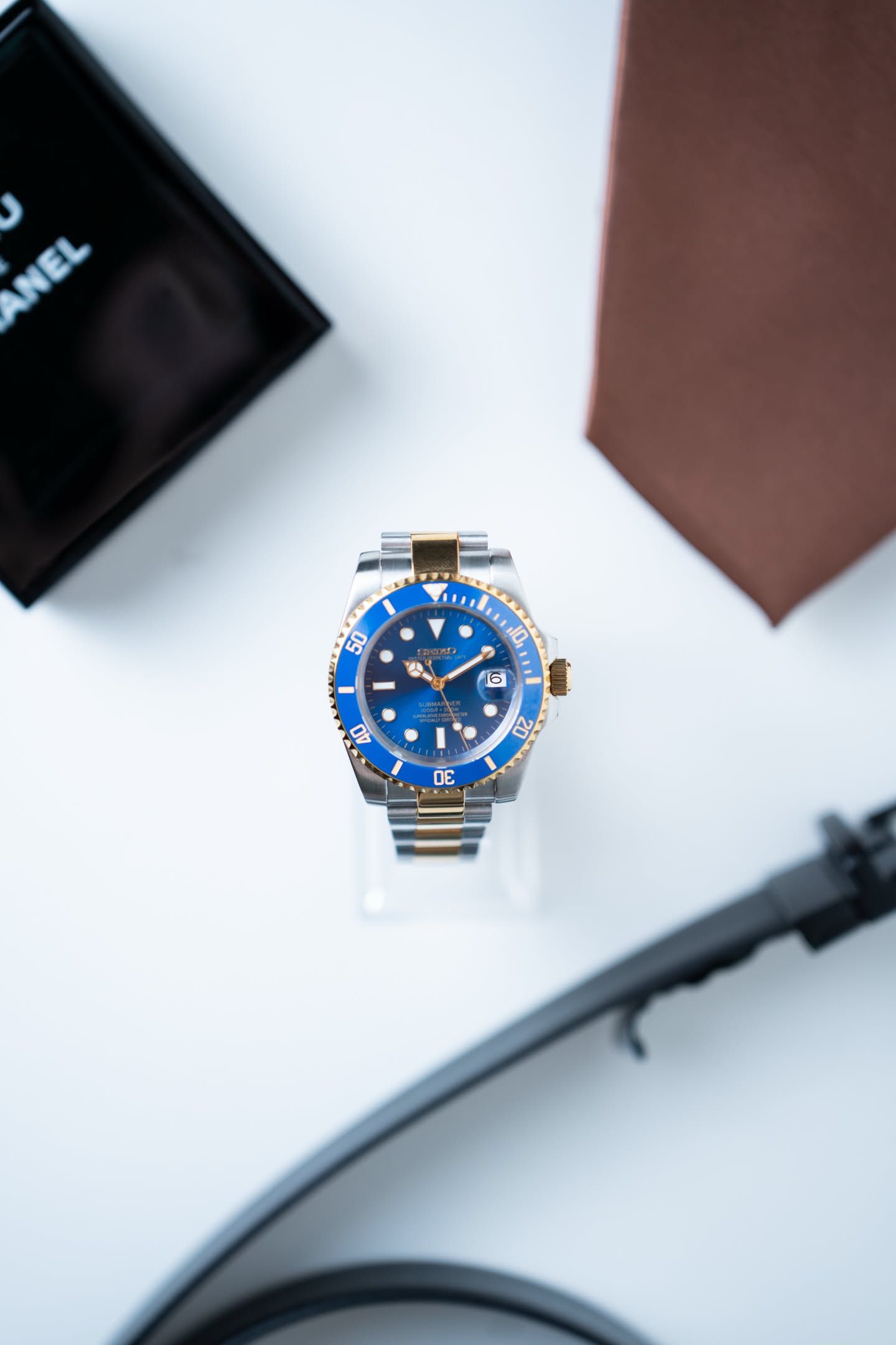 Bluegum standing upright, the blue bezel and two-tone bracelet.