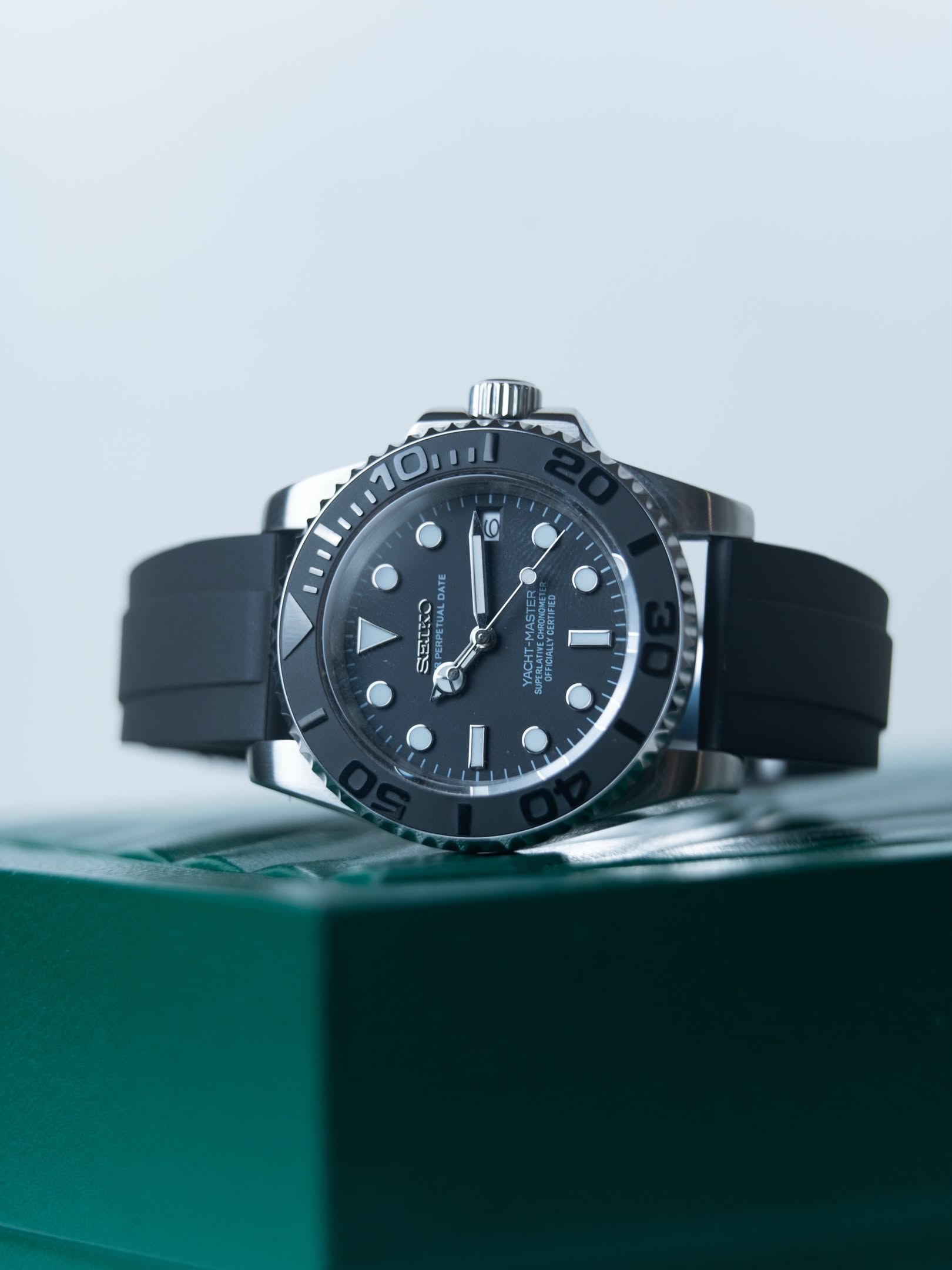 Blackthorn up close, its grey bezel with raised numerals and the slate dial.
